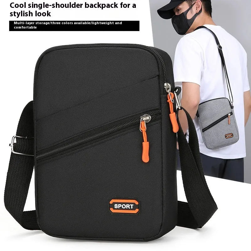Lightweight solid colour Oxford cloth crossbody commuter bag with contrast detailing