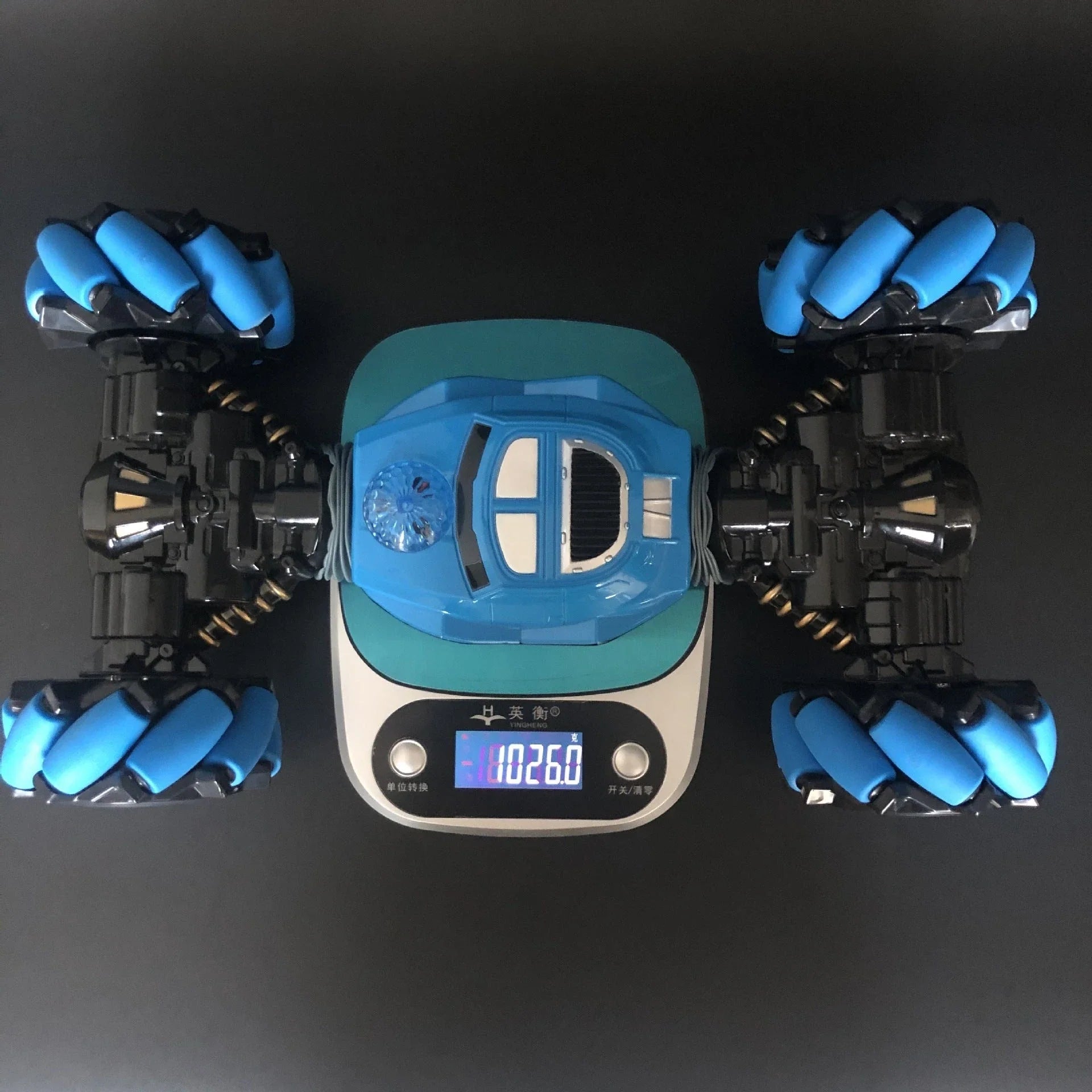 Gesture-sensing twisting off-road RC car in blue and red, featuring remote and watch control