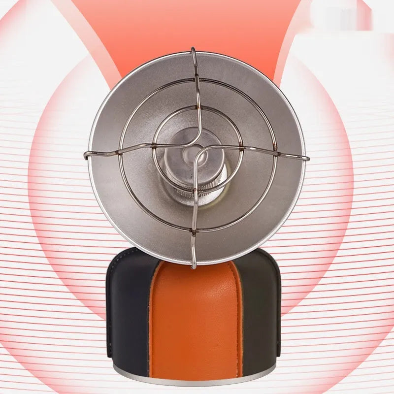 Black and orange portable outdoor gas heating stove with piezo ignition on a table
