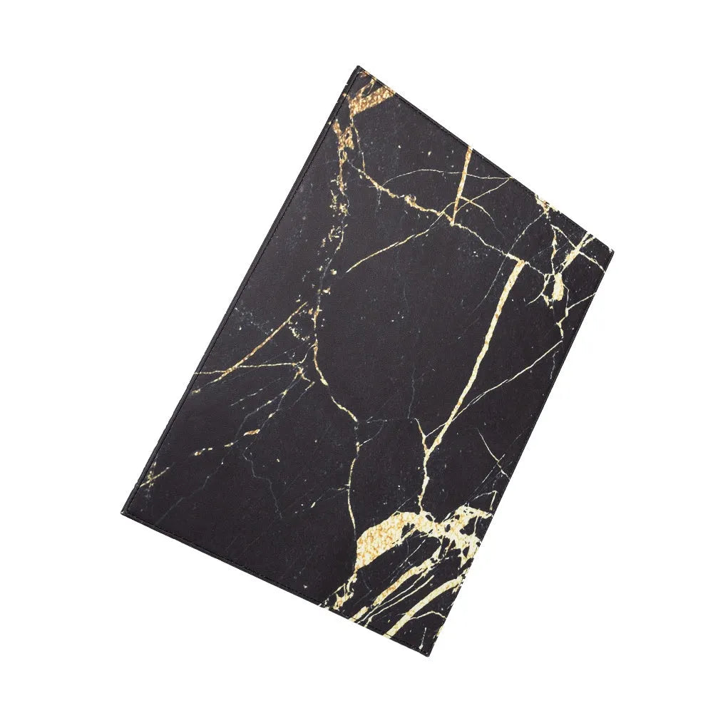 Anti-radiation printing tablet pad in colours black, black gold, blue, and green on a work surface.