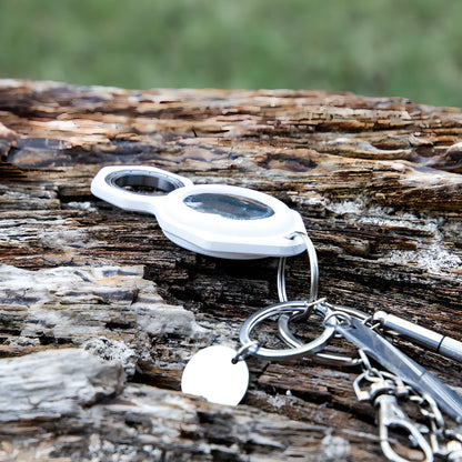 White zinc alloy Apple AirTag keychain case with protective cover and swivel keyring