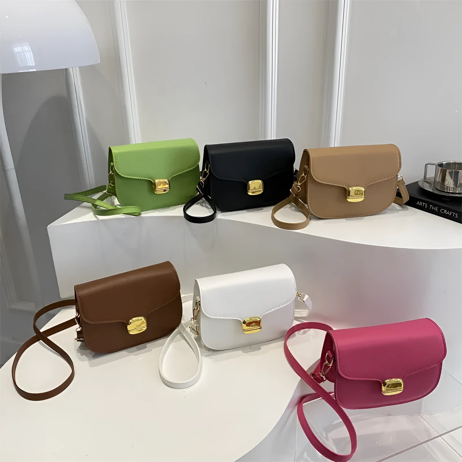 Simple PU leather women's handbag with interior zippered compartment and mobile phone pocket