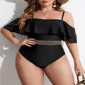 Black women's one-piece swimsuit on hanger, plus size range 0XL to 4XL.