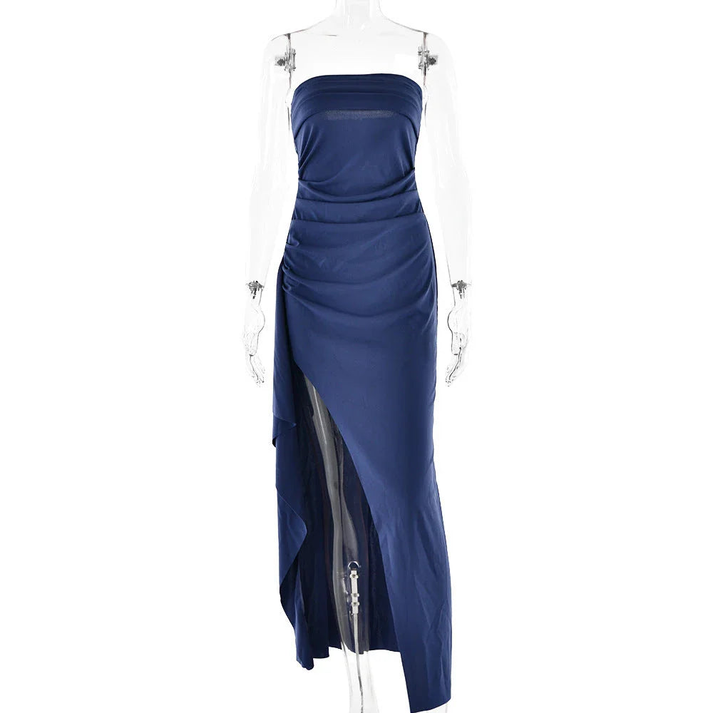 Elegant sleeveless maxi dress in various colors, featuring a backless design and an A-line silhouette for a flattering and sophisticated look.