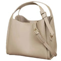 Women's soft cowhide crossbody bucket bag showing interior zipper compartments and sewing thread detailing