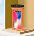 IPX8 certified mobile waterproof bag floating on water with phone visible through touch window
