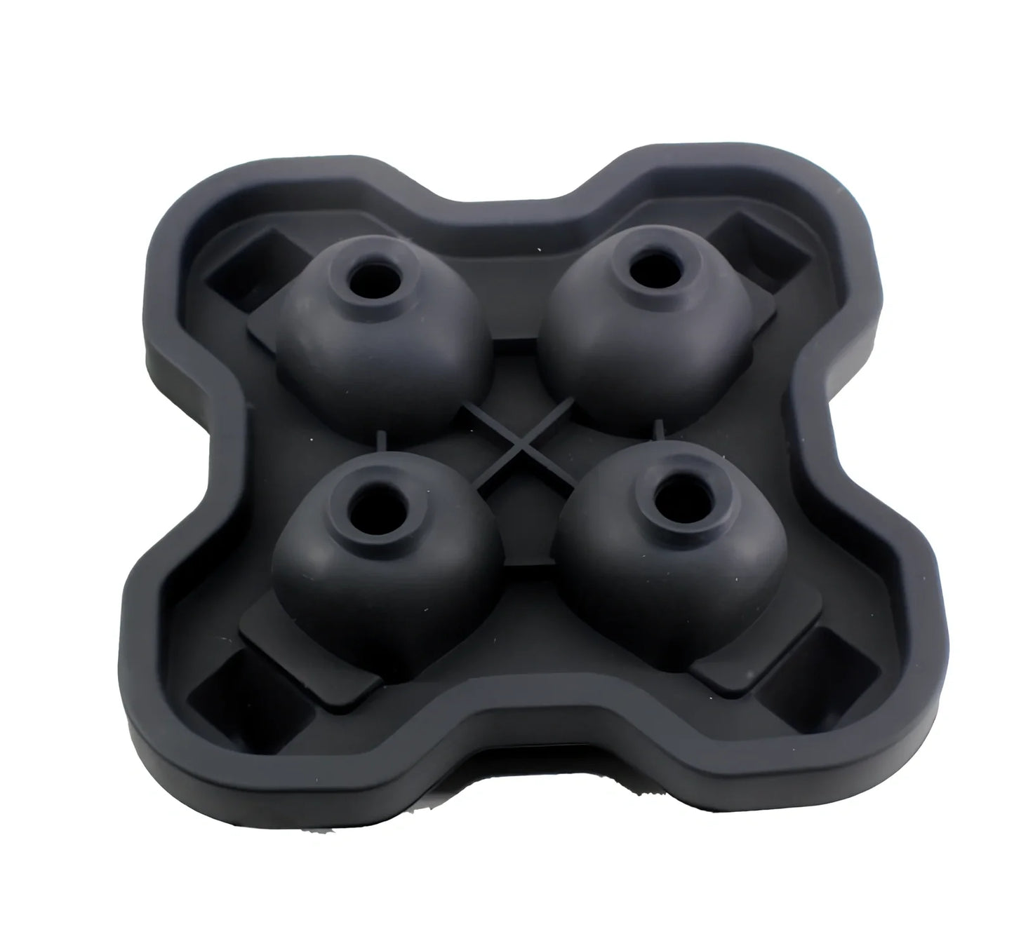 Black silicone ice cube tray with four skull-shaped cavities measuring 12cm long