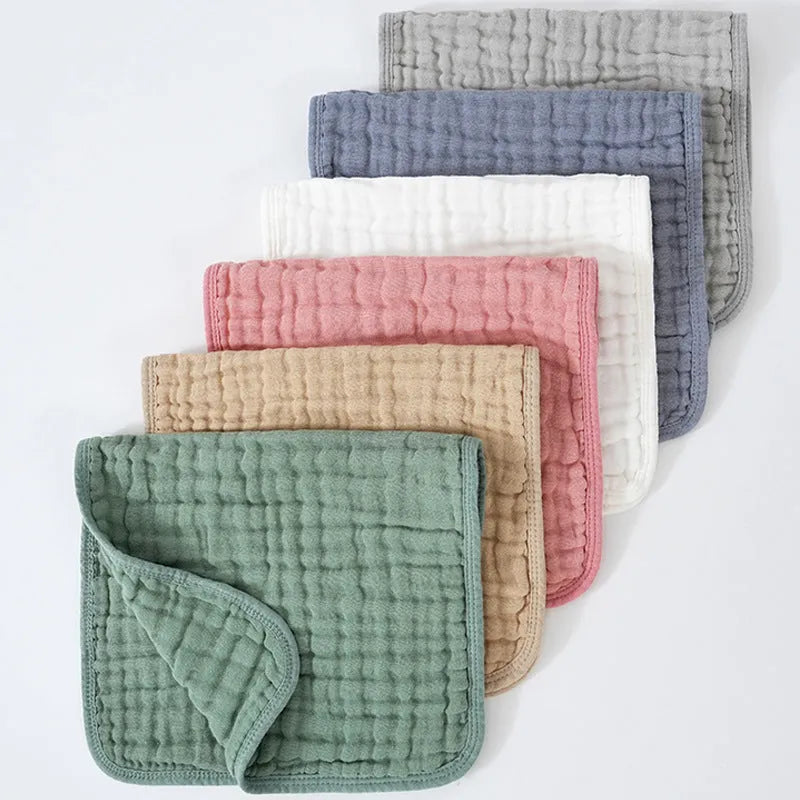 6-pack of large 25x50cm muslin burp cloths in assorted colours on light background