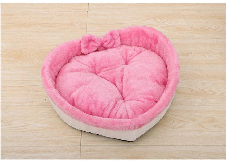 Cozy heart-shaped pet bed in grey and pink colors, designed for small, medium, and large dogs and cats