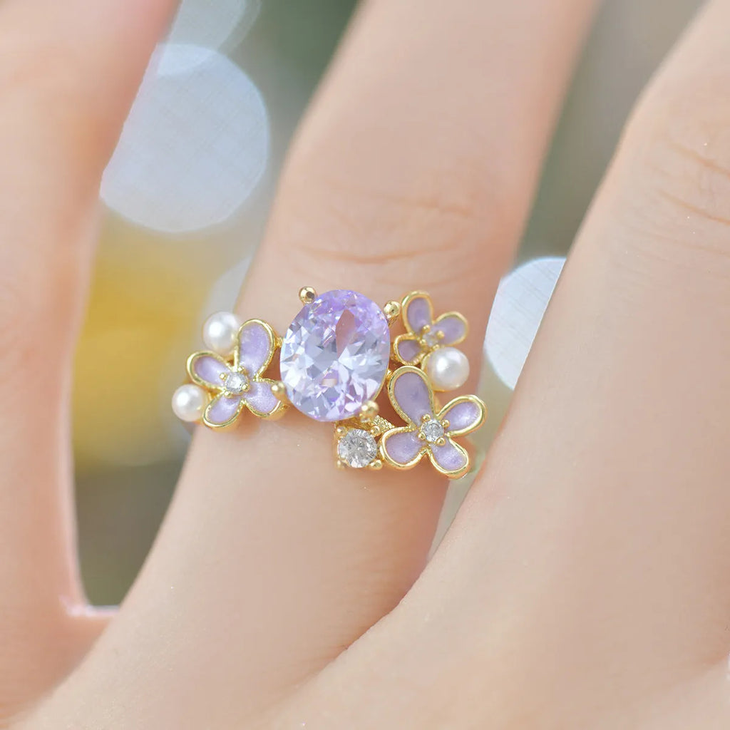 Women's open ring with flower design and zircon detail in light purple or yellow colour options