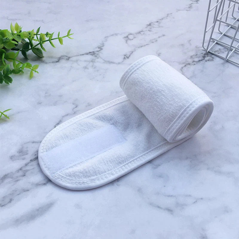 Soft polyester beauty headband for hair control during makeup, sports, and yoga.