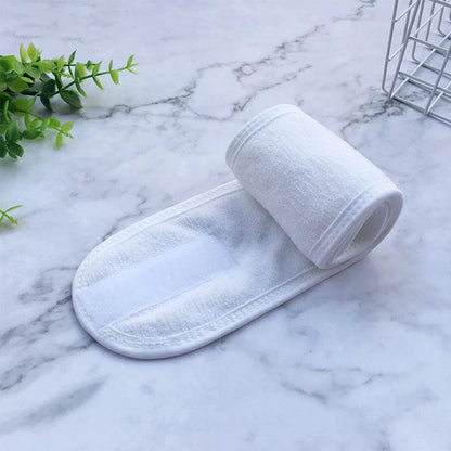 Soft polyester beauty headband for hair control during makeup, sports, and yoga.