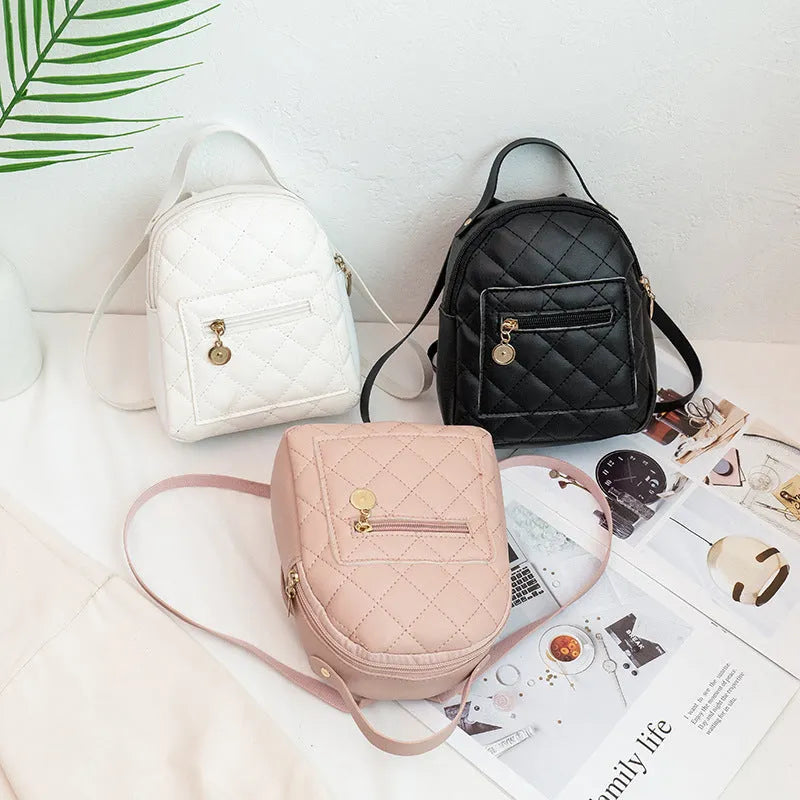 Girls' Korean style embroidery backpack in PU material with hard case construction measuring 16x7x19cm