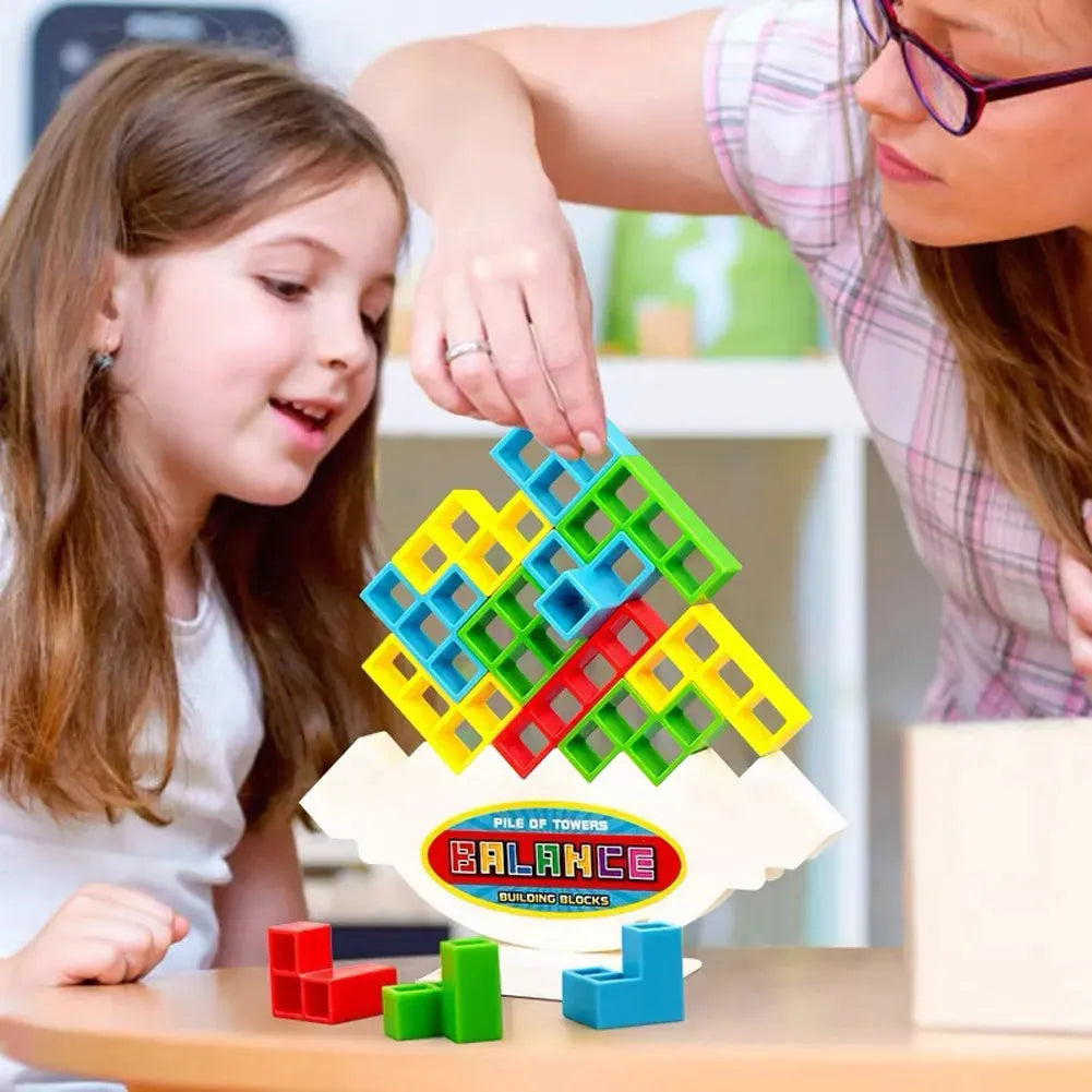 Plastic balancing stacking game with 16 colourful blocks and chassis for family entertainment