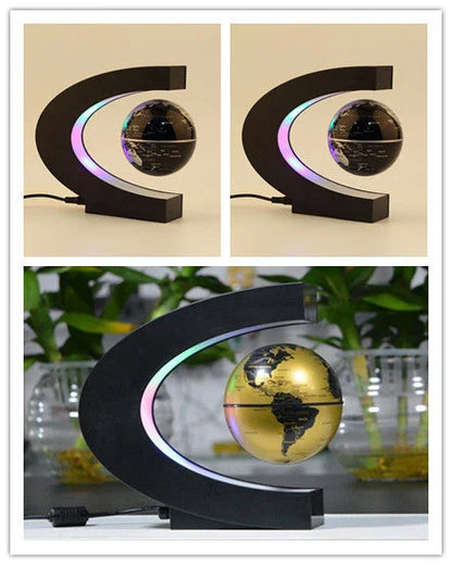 Magnetic levitation globe floating above base with LED light on