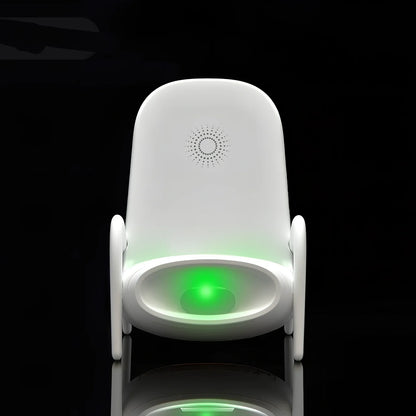 Black amplified wireless charger with bracket, 9.8 x 9.8 x 14.2 cm, for phone charging and audio boost