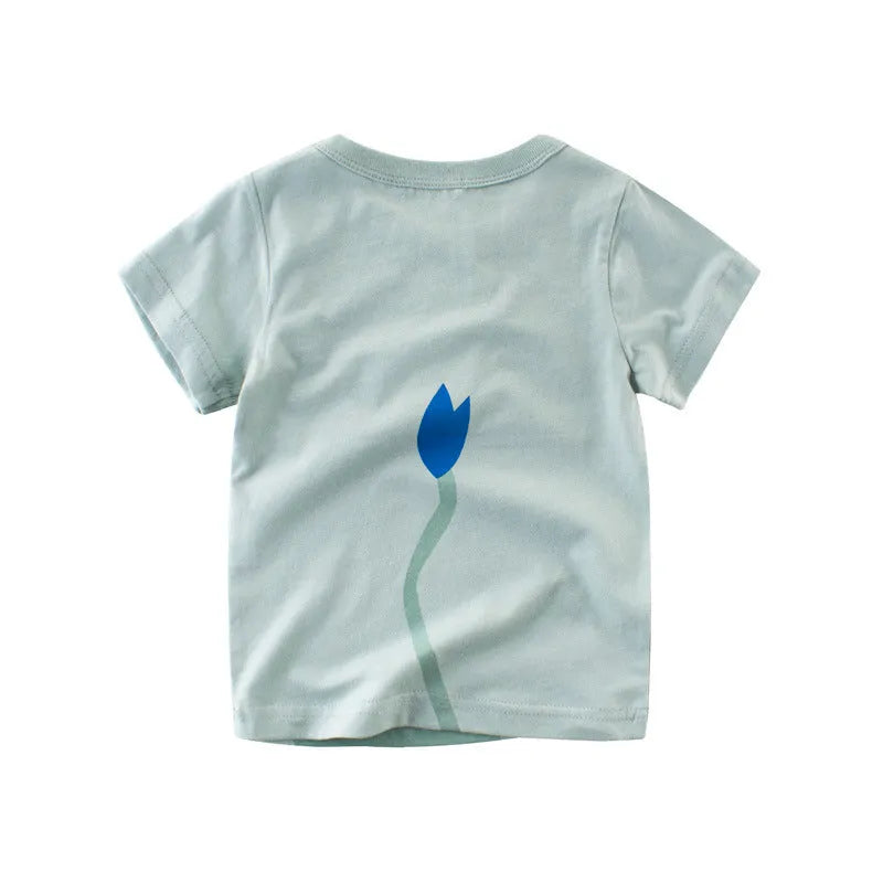 Boy wearing a cotton t-shirt with a green lion print, showing short sleeves and casual fit.