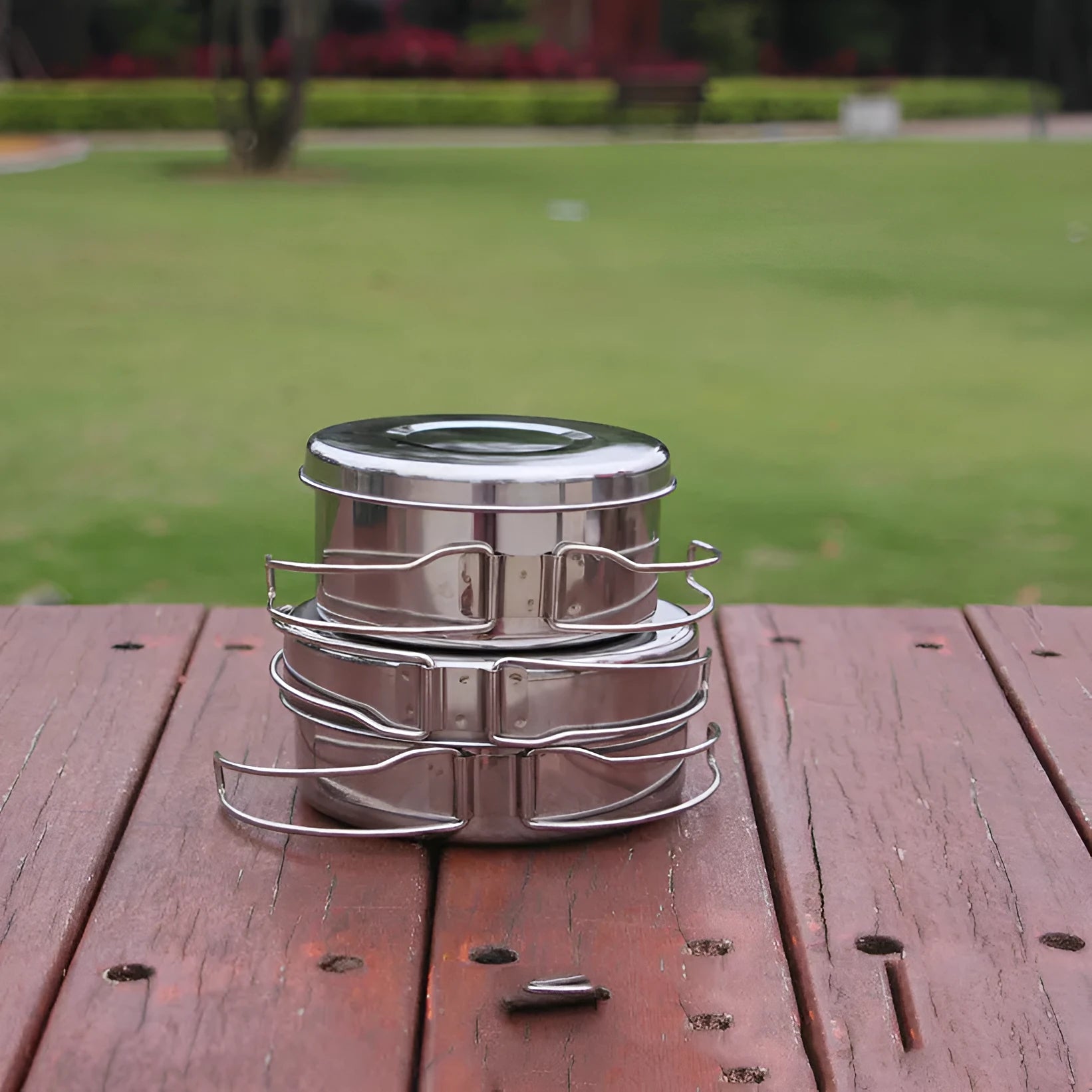 Silver stainless steel camping cookware pot set with 4 pieces including pot and pan for outdoor cooking