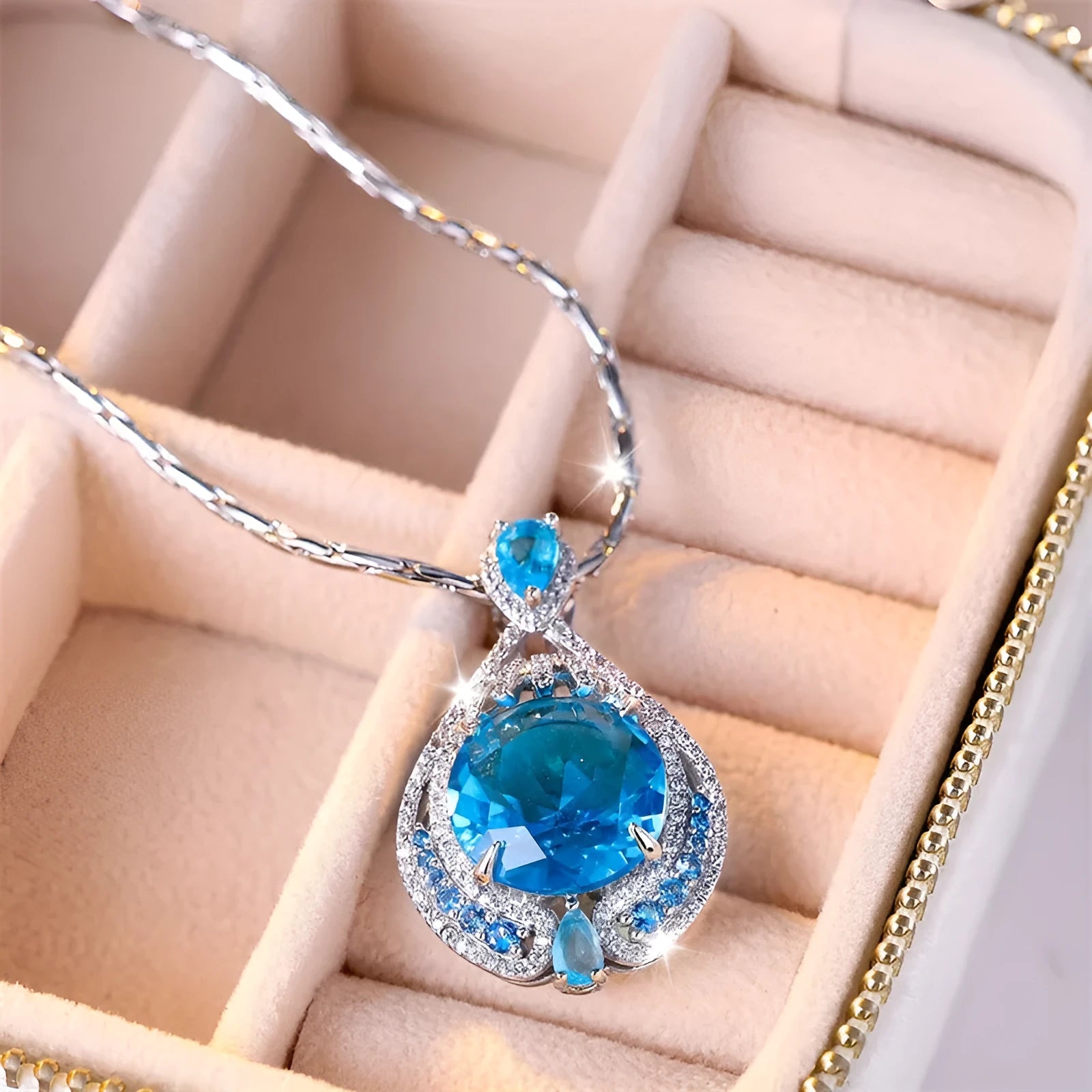 Blue crystal geometric necklace with fireworks cut gemstone on water wave chain