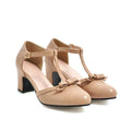 Women's apricot coloured chunky heel sandals with a bow detail and buckle strap on a 6.5cm heel.