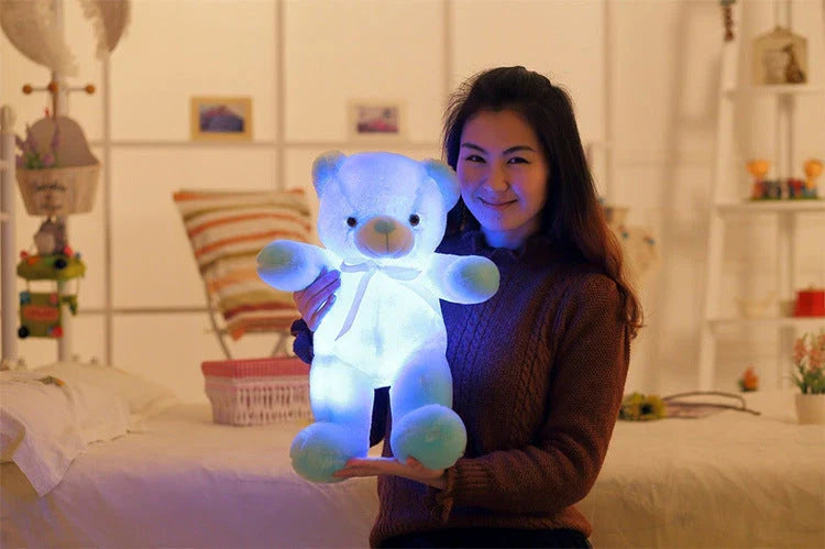 Colorful light-up plush teddy bear with over 7 changing LED colors, a cozy and unique Christmas gift for kids