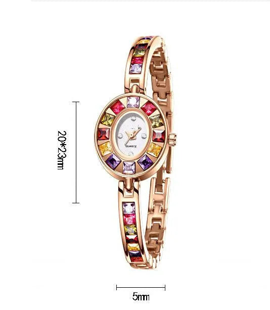 Women's small dial quartz watch with Austrian rhinestones in gold alloy finish