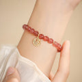 Glass bracelet with strawberry quartz detailing in New Chinese style with manual processing
