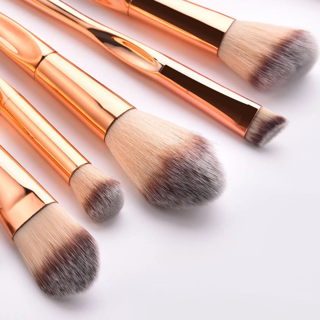 8-piece makeup brush set with nylon bristles, rose gold heart type handles, 22cm long, gold colour