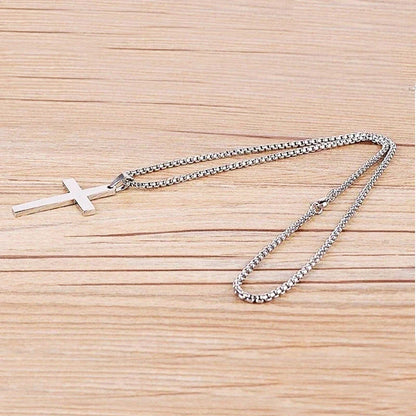 Stainless steel cross pendant necklace for men, available in black, silver, and gold finishes