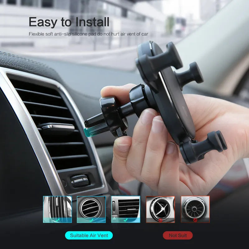 Black gravity car phone holder with 360-degree rotation ball joint mounted on a car air vent.