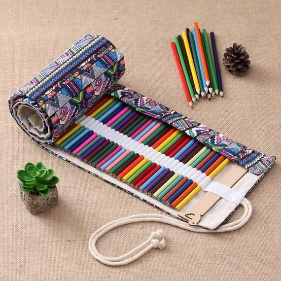 Canvas pencil wrap roll up case with multiple elastic bands holding pens and pencils, in a compact roll.
