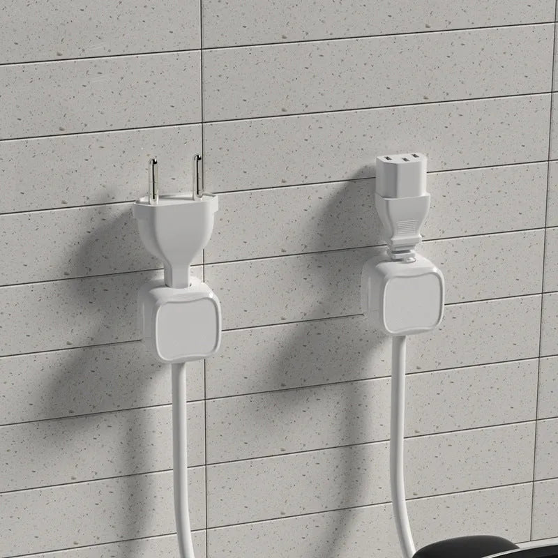 Black and white magnetic cable clips with adhesive backing for under desk wire organisation