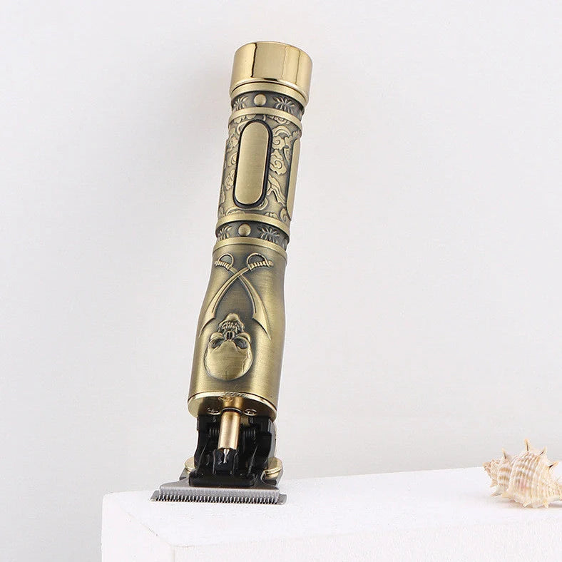 Gold skull hair clipper with USB charging port and cutting blades