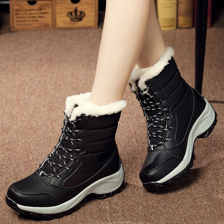 Women's velvet high-top snow boots with wedge heel and artificial hair lining in winter setting