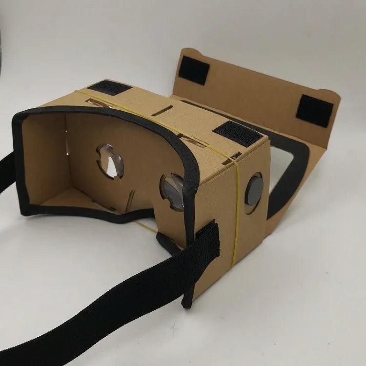 Pink and white foldable VR cardboard glasses headset with 3D lenses for smartphones.