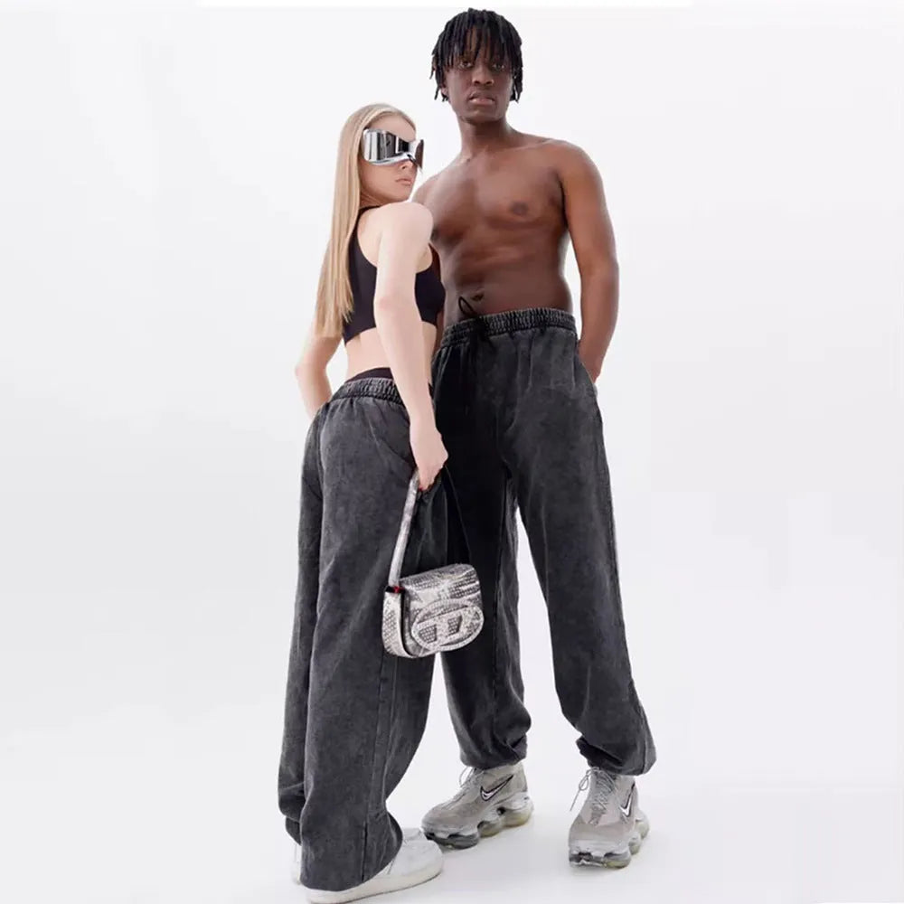 European and American men's loose hoodie pullover set with hood, long sleeves, and matching pants in a casual style