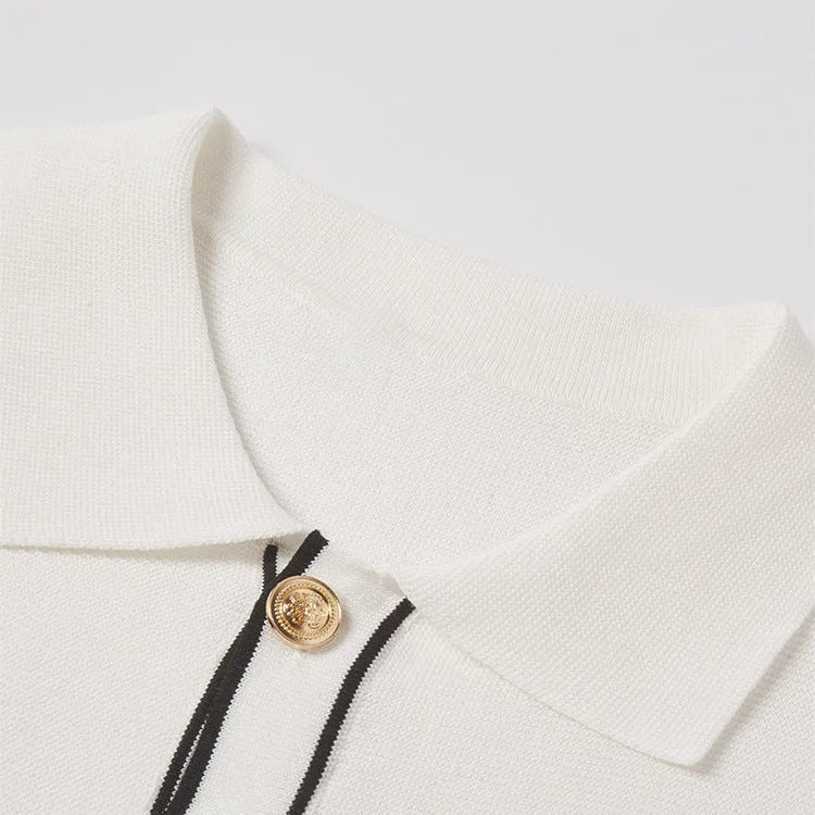 White short sleeve cardigan with contrasting colour lapels and collar on a model.