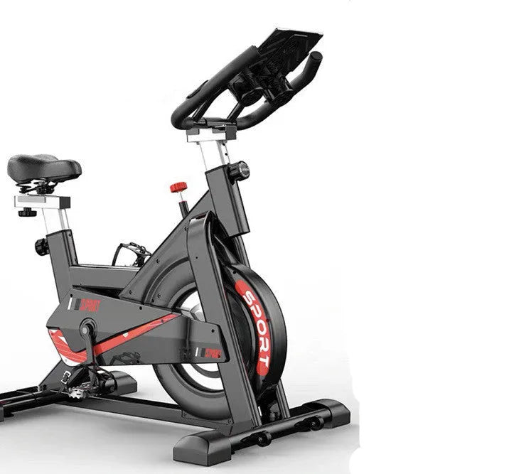Black upright spinning bike with padded saddle and handlebars for home fitness