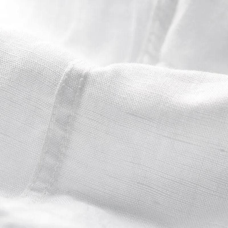 Men's loose fit linen short sleeve shirt with a square collar in sapphire blue.