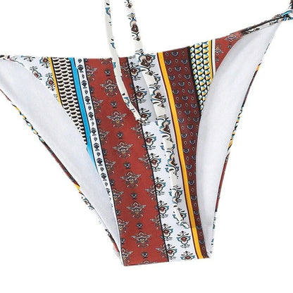 Women's mixed colour swimsuit with front lace-up ties and split leg design