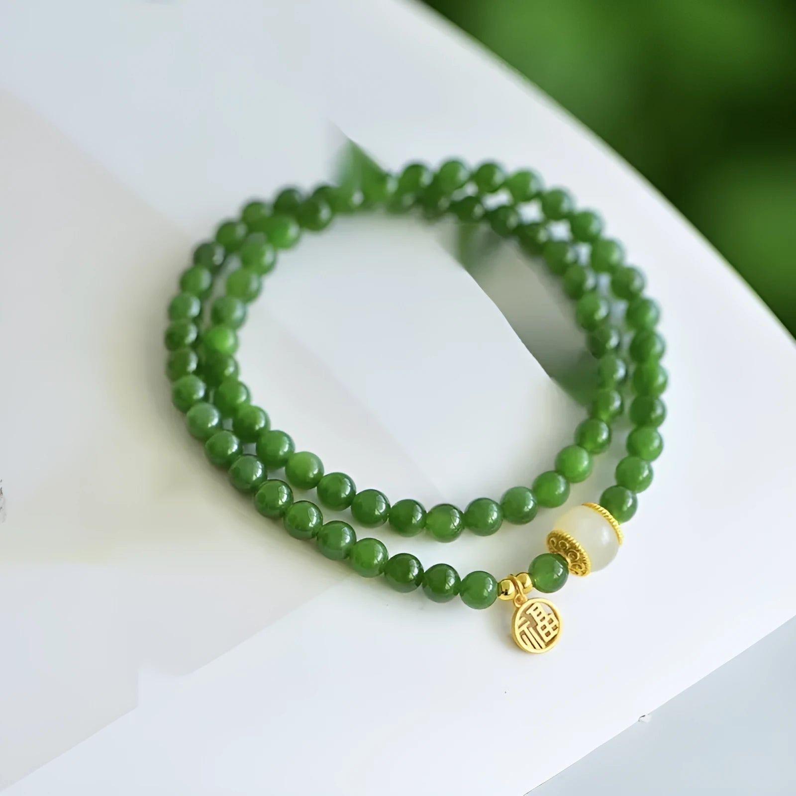 Women's double circle bracelet made of natural Hetian jade featuring a fu character, 6mm size.