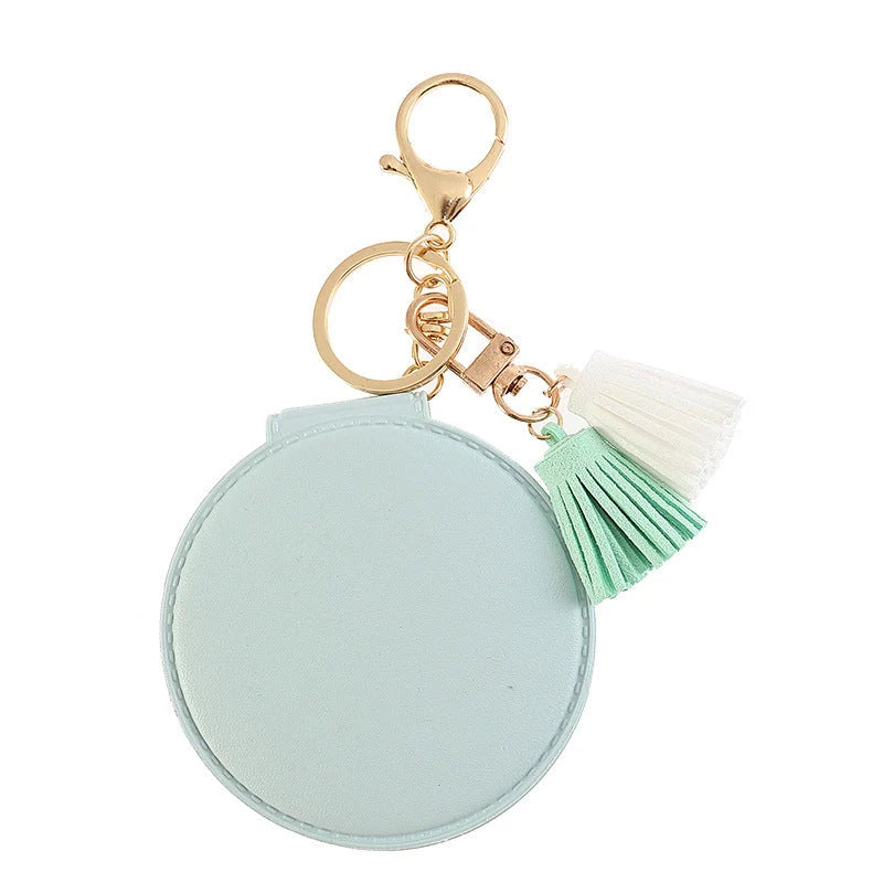 Mini round PU leather small mirror with tassel in various colours
