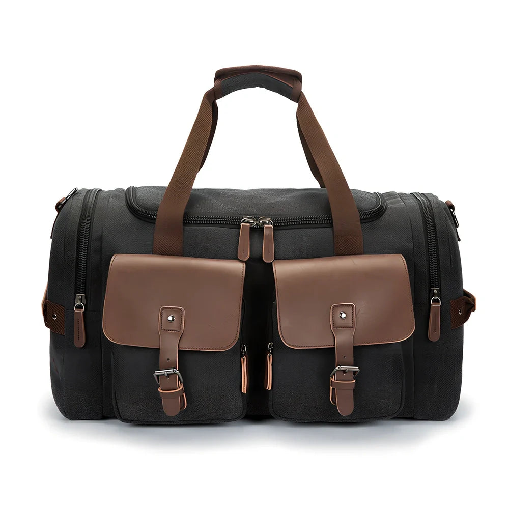 Medium canvas travel bag in black, 53x31x24cm with zipper top, double padded straps, waterproof canvas for 20-35L storage