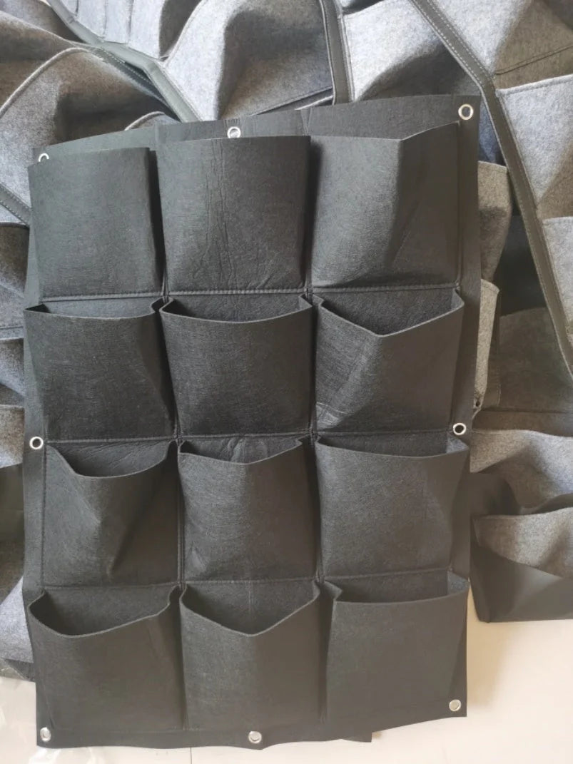 Wall mount hanging planting bags for vertical gardening in green and black
