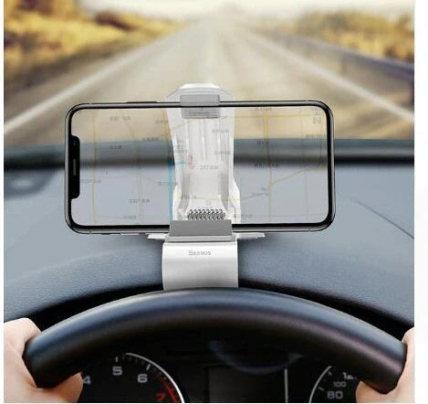 Black magnetic car phone holder with 360-degree rotation mounted on car vent