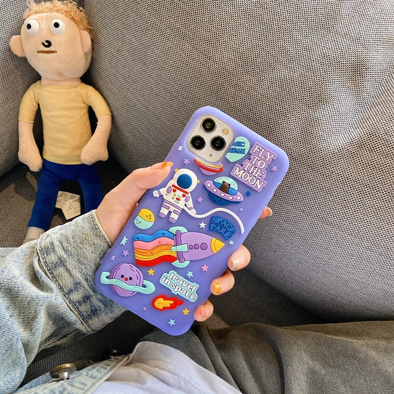 Purple silicone iPhone case with cartoon astronaut spaceman design showing precise port cut-outs