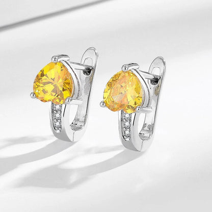 Loving Heart Zircon Ear Clips in white gold and yellow gold with diamond accents