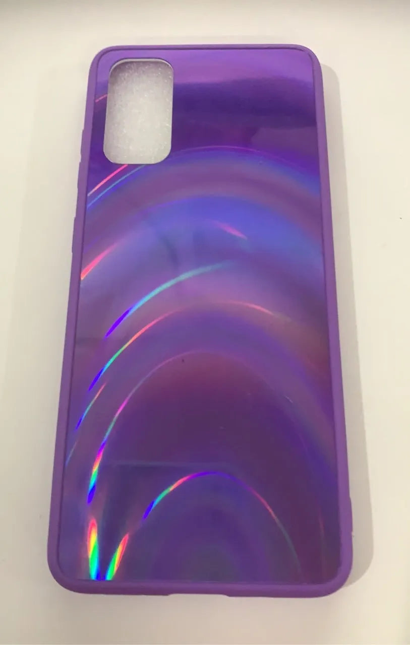 Marble pattern silicone phone case for Samsung Galaxy smartphone on a table.