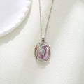 Baroque pendant freshwater pearl necklace clavicle chain with flower leaf motif in Golden Leaves colour, on display