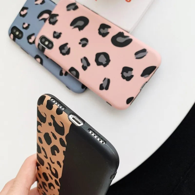 Leopard print iPhone phone case shown in black, blue, and pink colour options.